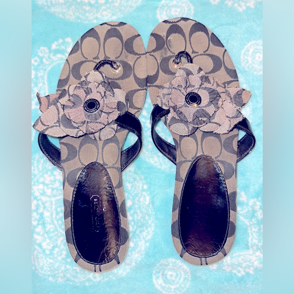 Used Coach flower flip flops size 10